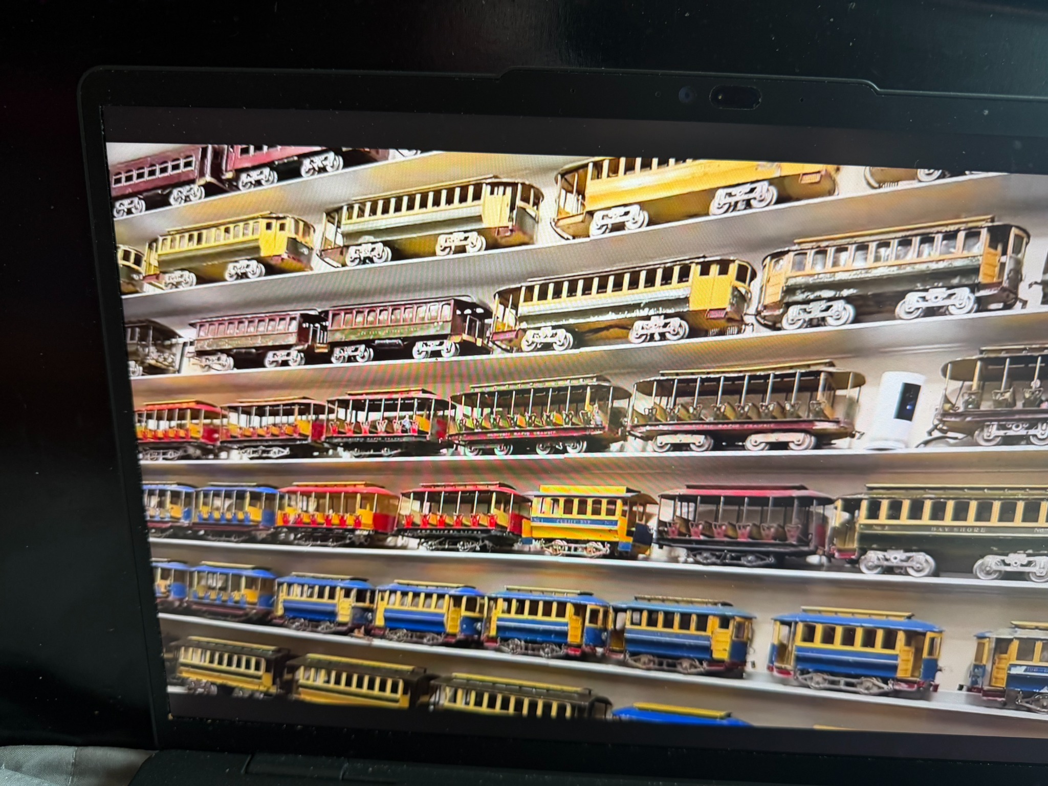 Vintage Lionel electric trains displayed on shelves